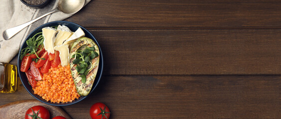 Delicious lentils served on wooden table, flat lay. Banner design with space for text