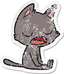 distressed sticker of a talking cat cartoon
