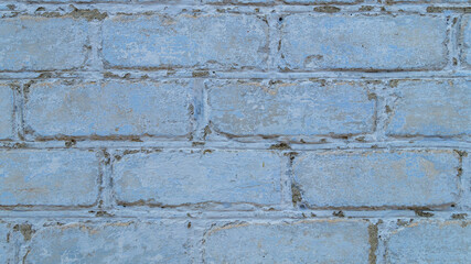 Brick wall of the house. The brick wall of the house is painted blue. Blue wall of the house. Brick background painted in blue