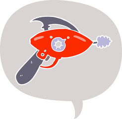 cartoon ray gun with speech bubble in retro style
