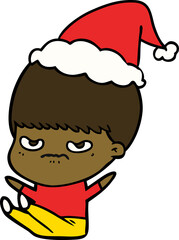 hand drawn line drawing of a boy wearing santa hat