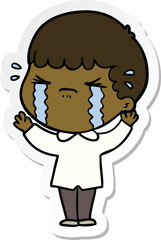 Obraz premium sticker of a cartoon man crying