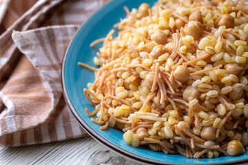 Traditional delicious Turkish food; bulgur pilaf with chickpea (Turkish name; nohutlu bulgur pilavi)
