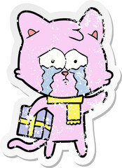 distressed sticker of a cartoon cat