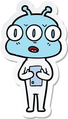 sticker of a cartoon three eyed alien