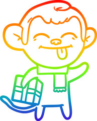 rainbow gradient line drawing of a funny cartoon monkey with christmas present