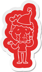 quirky cartoon  sticker of a crying woman wearing santa hat