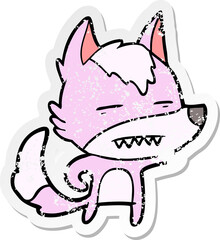 distressed sticker of a cartoon wolf showing teeth