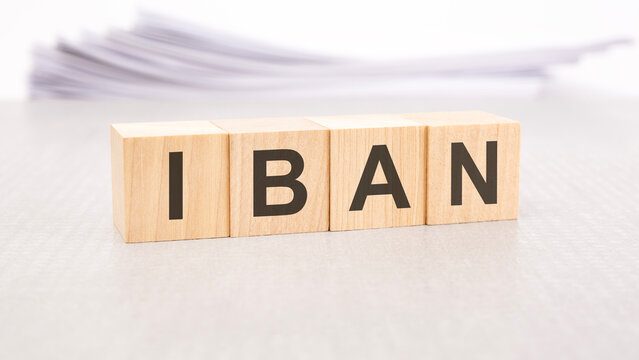 iban word written on wood cubes with white background