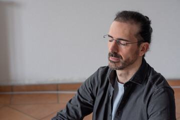 Obraz premium portrait of a man with closed eyes, meditation