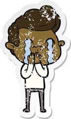 distressed sticker of a cartoon man crying