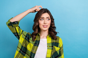 Photo of funky unsure lady wear checkered jacket finger head forget looking empty space isolated...