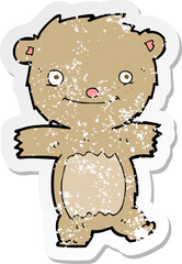 retro distressed sticker of a cartoon teddy bear