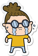 sticker of a cartoon crying woman wearing spectacles