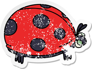 Fototapeta na wymiar distressed sticker of a quirky hand drawn cartoon ladybird