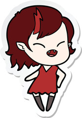 sticker of a cartoon laughing vampire girl