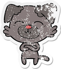 distressed sticker of a cartoon dog crossing arms