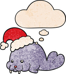 cartoon christmas walrus with thought bubble in grunge texture style
