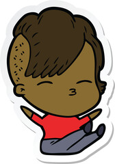 sticker of a cartoon squinting girl