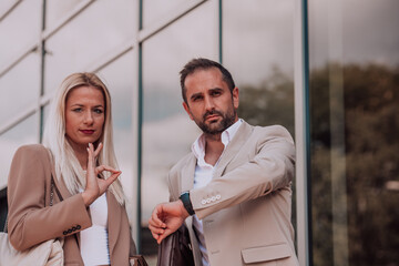 Modern business couple after a long day's work, walking together towards the comfort of their home, embodying the perfect blend of professional success and personal contentment.