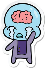 sticker of a cartoon big brain alien crying