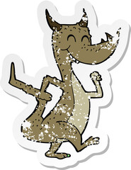 retro distressed sticker of a cartoon happy dragon