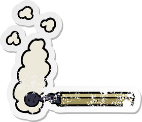 distressed sticker of a cartoon burnt match