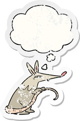 cartoon rat with thought bubble as a distressed worn sticker