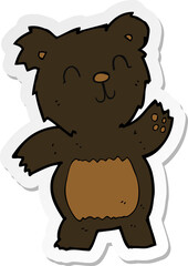 sticker of a cartoon black bear