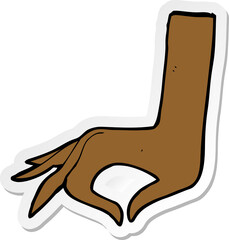 sticker of a cartoon hand symbol