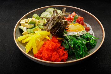 pibimpap with flying fish roe, meat, fish, and nori