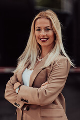 A powerful portrait of a businesswoman, standing confidently with her arms crossed, representing...