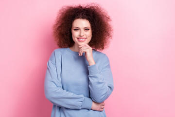 Photo of confident smart woman dressed blue sweatshirt smiling arm chin isolated pink color background