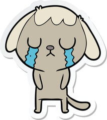 sticker of a cute cartoon dog crying