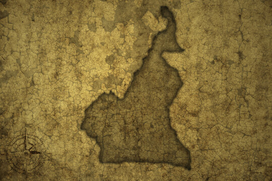 map of cameroon on a old vintage crack paper background .