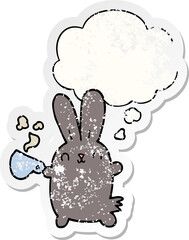 cute cartoon rabbit with coffee cup with thought bubble as a distressed worn sticker