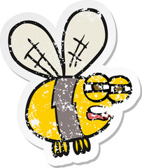 retro distressed sticker of a cartoon bee