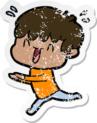 distressed sticker of a cartoon laughing boy