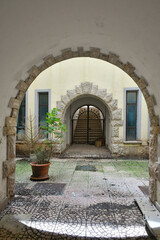 Fototapeta na wymiar Entrance arch in the town hall of Sant'angelo dei Lombardi, a village in the province of Avellino, Italy.