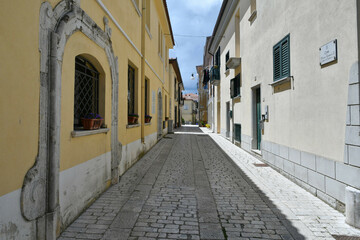 A narrow street in Sant'Angelo dei Lombardi, a small mountain village in the province of Avellino,...