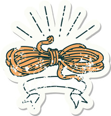 worn old sticker of a tattoo style wound rope