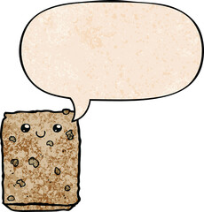 cartoon biscuit with speech bubble in retro texture style