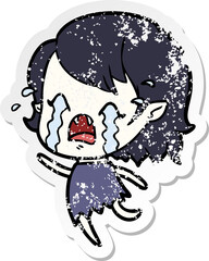 distressed sticker of a cartoon crying vampire girl