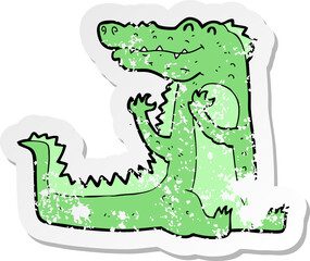 retro distressed sticker of a cartoon crocodile