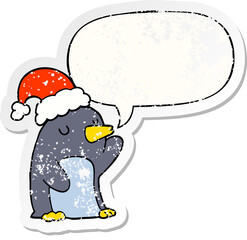 cute cartoon christmas penguin with speech bubble distressed distressed old sticker