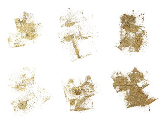 Set of sparkle golden brush strokes. Collection of grunge golden paint texture for greeting card design isolated
