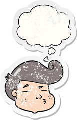 cartoon boy's face with thought bubble as a distressed worn sticker