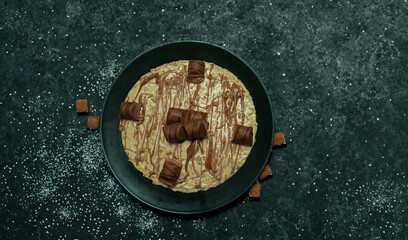 kinder bueno chocolate cheesecake and vanilla dessert

