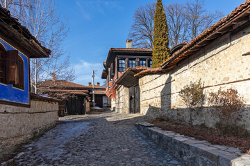 Fototapeta na wymiar Street and old houses in town of Koprivshtitsa, Bulgaria