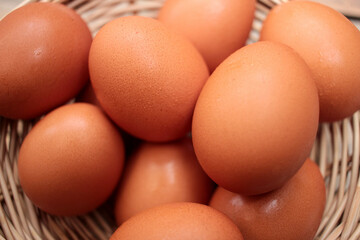Chicken eggs in a wicker basket